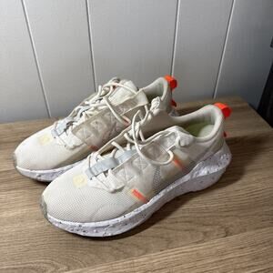 Nike Women's White Sneakers with Orange Accents